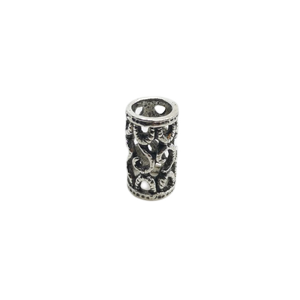 Korálek se zakroucenými ornamenty